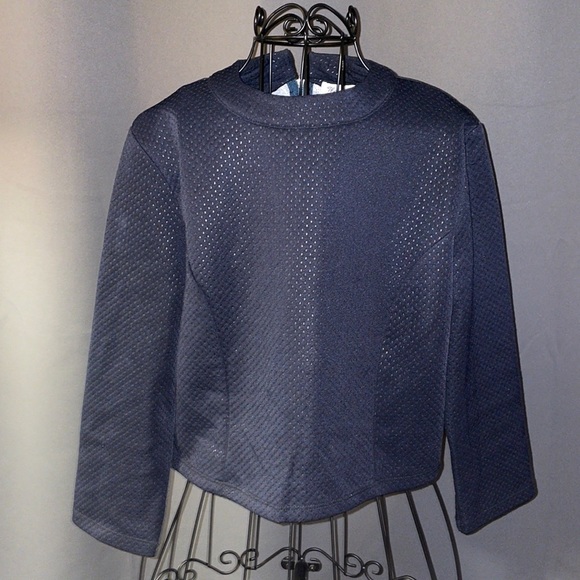 The Hanger By Taylor Hadley Tops - NWOT.  Women’s size 4 navy blue top.